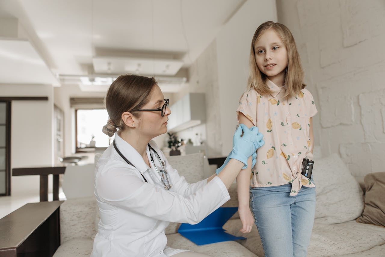 DHS Home-Care Services A pediatrician checks a child